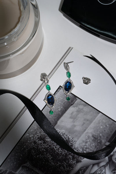 5.61 Carat Blue Sapphire and 1.20 Carat Emerald Earrings in 18K White Gold